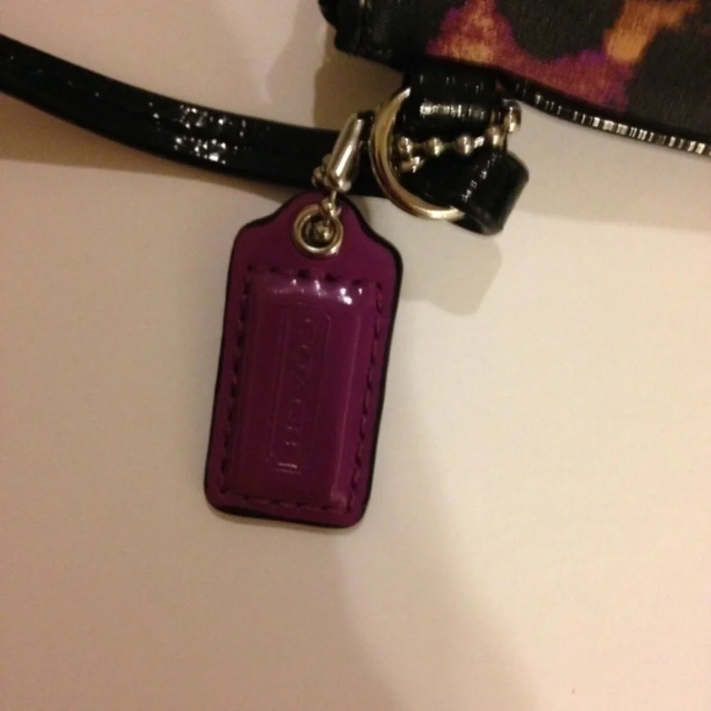 Coach rare ocelot wristlet purple animal print